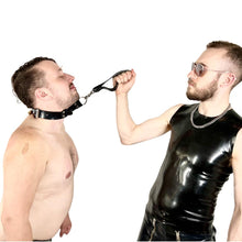 Load image into Gallery viewer, Short Heavy Rubber Leash - Vilain Garçon - a heavy rubber short leash for BDSM held by a rubber dom pulling on a heavy rubber locking choking collar worn by a sub
