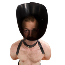 Load image into Gallery viewer, The Cone of Shame - Vilain Garçon - a heavy rubber cone of shame locked on a submissive with a heavy rubber shoulder-to-wrist restraint top vie
